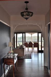 A View down a Hallway of a Renovated Colonial Homestead to the Living Room